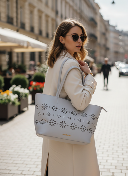 Vrouwelijk &amp; stijlvol: schoudertas voor dames met bloemenperforatiepatroon